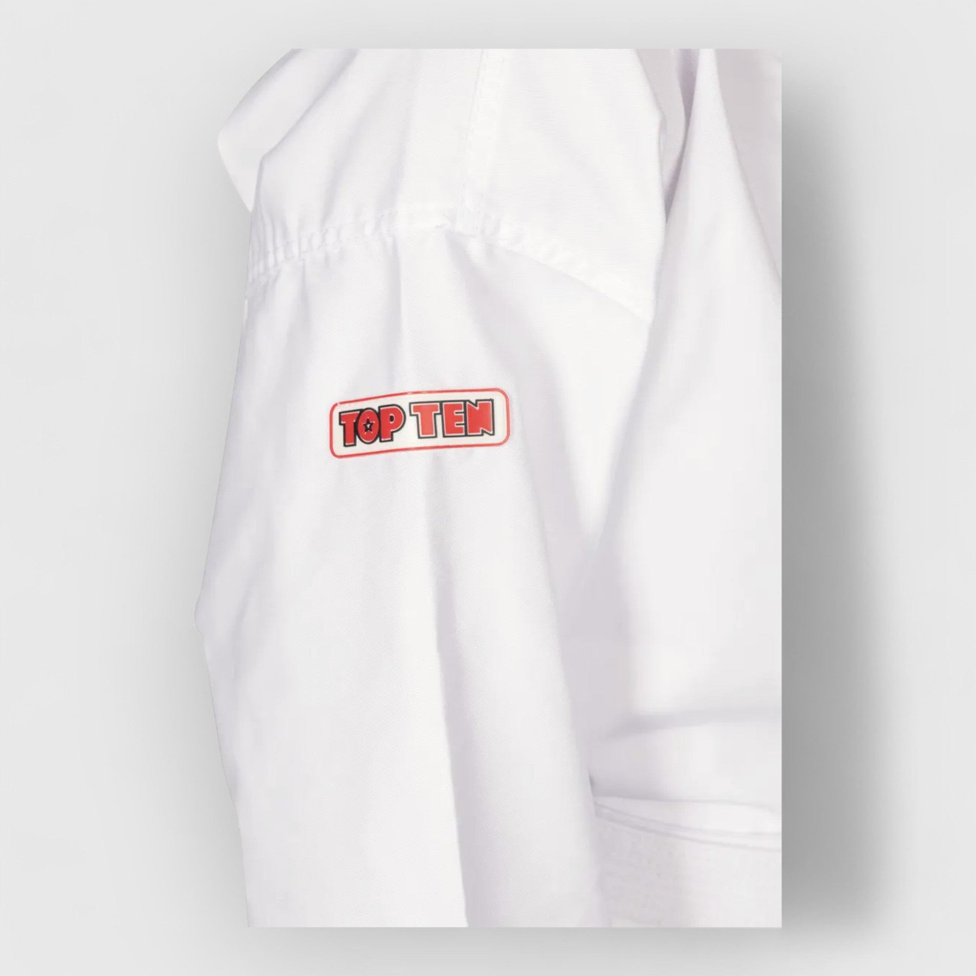 TOP TEN Elite Kyong ITF Nybegynnerdrakt Slip in - CombatStore.no