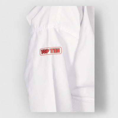 TOP TEN Elite Kyong ITF Nybegynnerdrakt for barn (ITF godkjent) - CombatStore.no